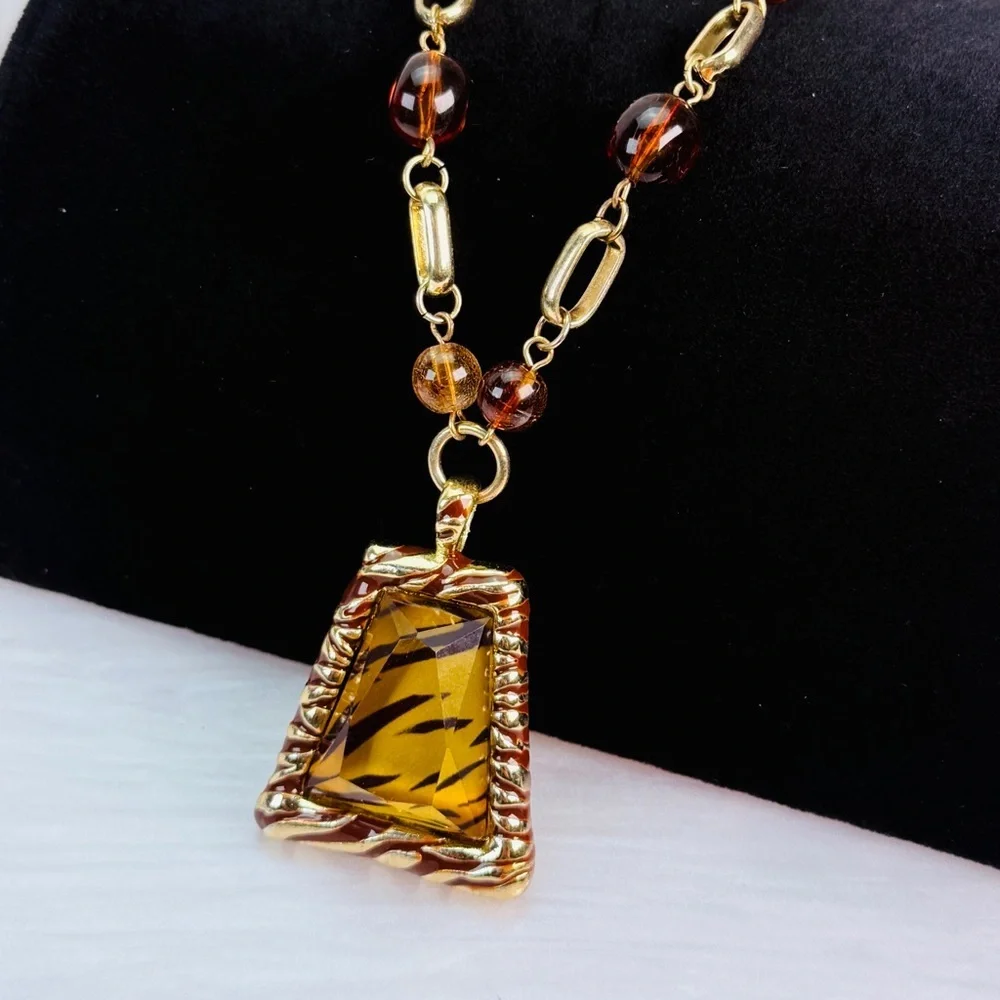 Beautiful, bohemian chic, dressy, animal, print pendant costume necklace